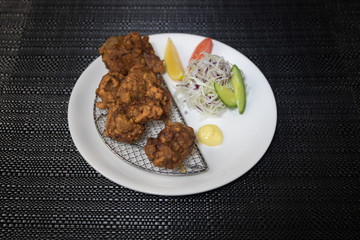 Close up view of plate with japanese food inside. Japan traditional food on wooden table.