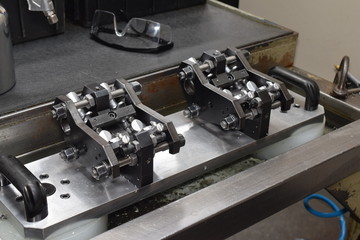 Fototapeta na wymiar Preparation of parts of airbrush and spray gun for CNC lathe machining.