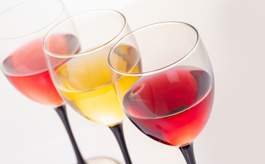 white and red wine in glasses