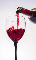 red wine pouring glass