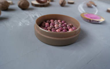  Pink blush on gray background