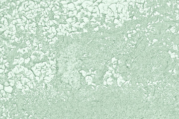 Greenish wood texture with peeling paint. Old chipboard. Abstract background