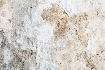 Abstract artistic empty old brick wall texture background with damaged plaster show grungy rough texture.
