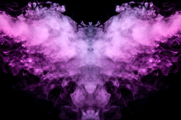 Fototapeta na wymiar Abstract mystical bat silhouette straightened wings from streams of colorful smoke evaporating from a vape illuminated by neon lights on a black background.