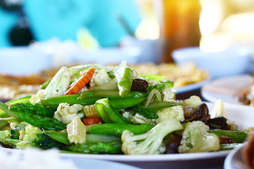 fried stir mixed vegetable with oyster sauce in white dish