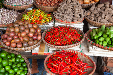 tropical spices and fruits sold at a local market in Hanoi (Vietnam)