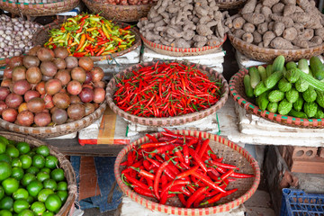 tropical spices and fruits sold at a local market in Hanoi (Vietnam)