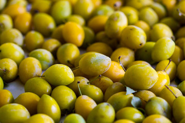 Ripe yellow plums