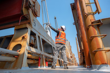 loading master in charge on loading the cargo on to generalcargo ship by command the operation on...