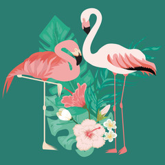 Couple of flamingo standing on tropical leaves