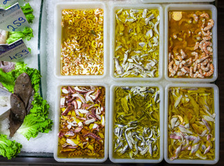 seafood fast food in plastic boxes