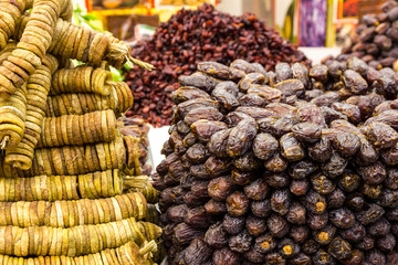 dates and figs dried fruits on market.