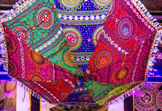 Sun umbrella in Indian style, multicolor souvenir in Dubai