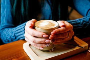 coffee in the hands of girls