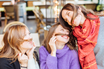 Girls having fun together - female friendship concept