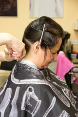 Hair cutting in the beauty salon.