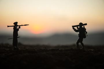 Military soldier silhouette with bazooka. War Concept. Military silhouettes fighting scene on war...