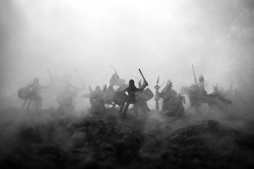 Medieval battle scene with cavalry and infantry. Silhouettes of figures as separate objects, fight...