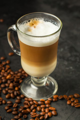 coffee fresh and hot in a white cup, aroma. serving of beverage (coffee grain). food. top view. copy space