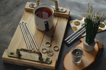 Cup of tea on a wooden tray