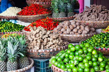 tropical spices and fruits sold at a local market in Hanoi (Vietnam)