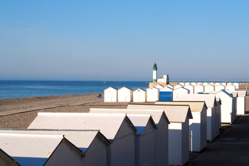 view of bathers' huts on the beach of Le Tr&eacute;port in Normandy - France