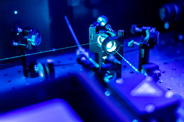Fototapeta laser reflect on optic table un quantum laboratory b obraz