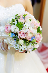 bride holding wedding bouquet