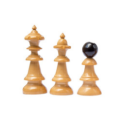 Old chess pieces isolated on white background