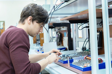 student conduct physical experiments at the university b