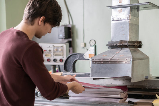 Worker At The Typography Printing Newspaper Or Journal B