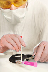 Unpacking of evidence - syringe with narcotics from place of crime