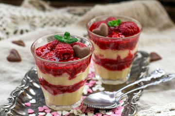 Fruit layered dessert in verrines with raspberries and French custard pastry cream