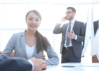 female consultant sitting at her Desk
