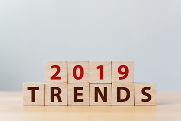 2019 trend concept. The word TRENDS on wooden cube block