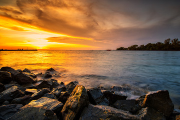 Wave hit the rock fog clouded the water stone the exposure twilight in the sea. beautiful sea rocks. 