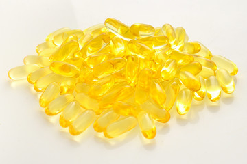 Fish oil pills isolated on white background.