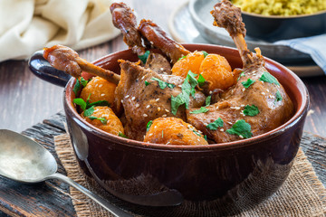 Duck tagine with clementines and citrus couscous