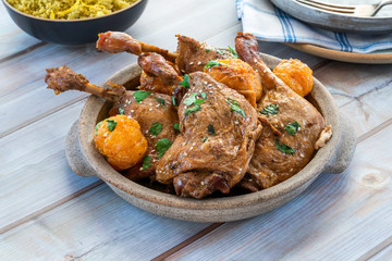 Duck tagine with clementines and citrus couscous
