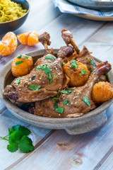 Duck tagine with clementines and citrus couscous