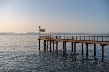 Fototapeta na wymiar Pier at sunrise