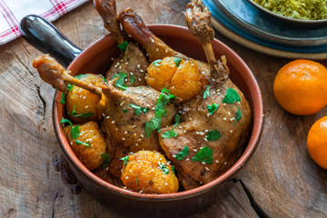 Duck tagine with clementines and citrus couscous - high angle view