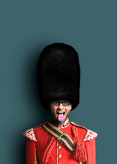 Young man in the costume of the Royal guards of Britain