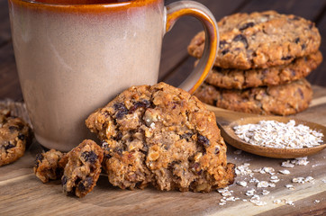 Oatmeal Raisin Nut Cookie Pieces With Coffee Cup