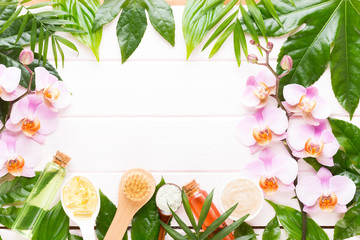 Beauty and fashion concept with spa set on pastel rustic wooden background.