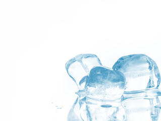 Ice cubes on reflective surface. Mirror reflection. Clipping path included.