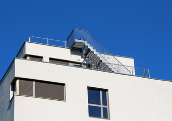modern building with stairs to the rooftop