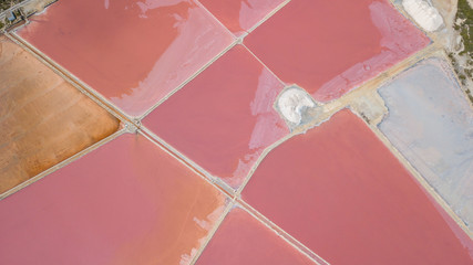 Earth's line. A drone vertical perspective of the ground's colors and shapes. Salt flats at Colonia de Sant Jordi, Ses Salines, Mallorca, Spain