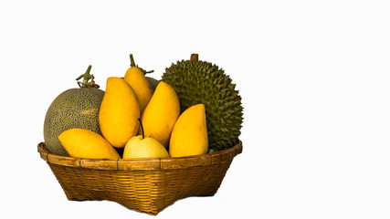 Fruit in a wooden basket with mango and durian white background