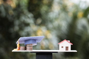 Investment and Education saving ideas : Dropshipping money coins to Graduation cap on wood balance...